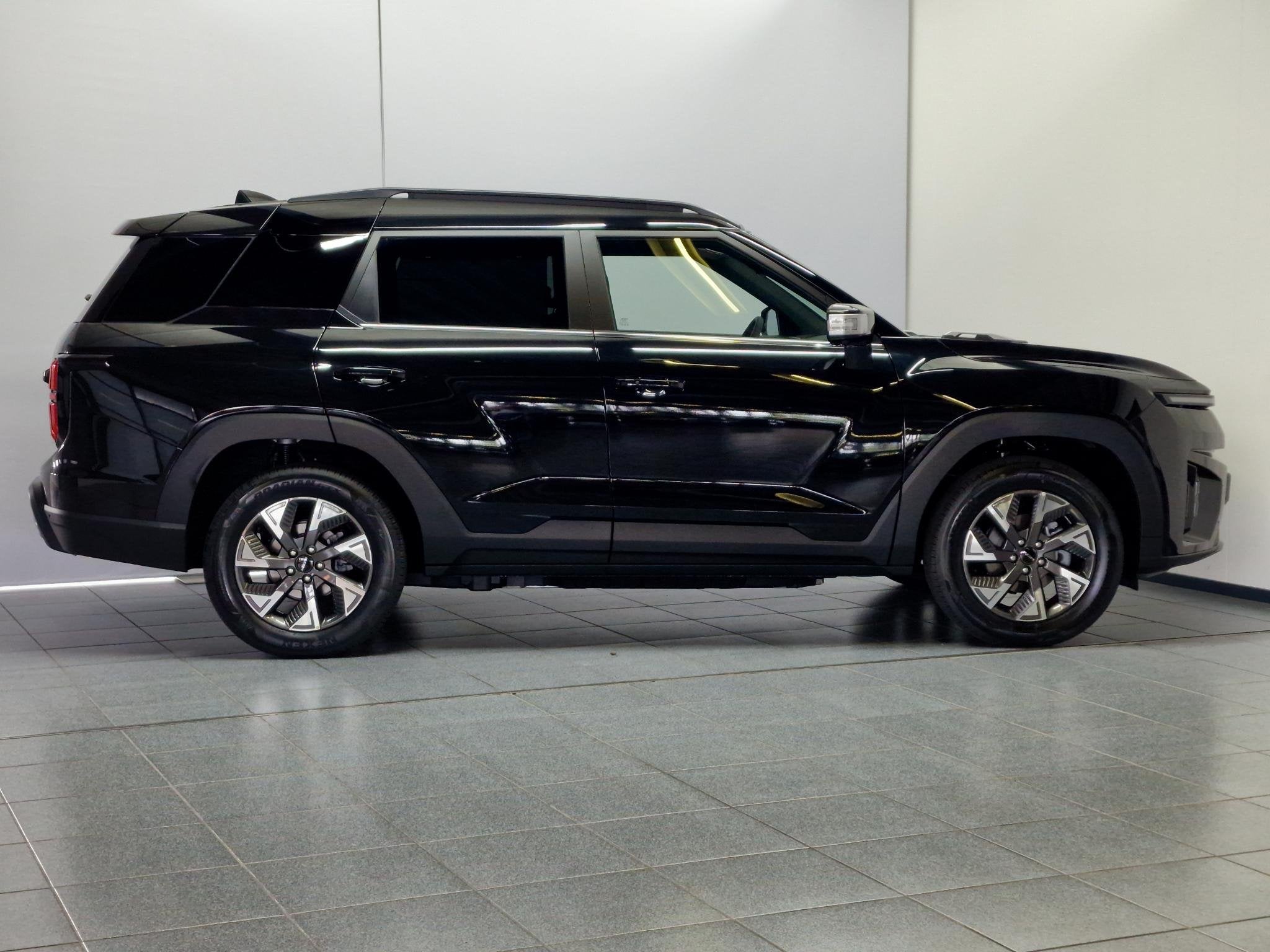 KGM Torres EVX Business Edition 80.6 kWh Lederen bekleding m, Auto's, Overige Auto's, Zwart, 620 min, Zwart, Nieuw