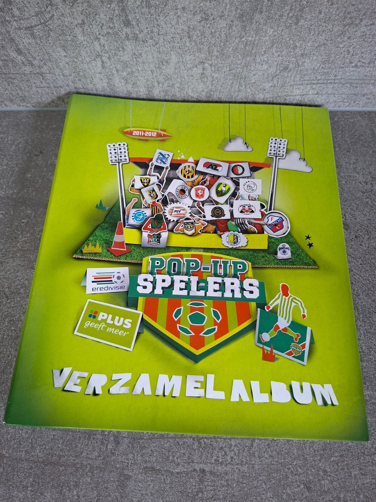 PLUS Eredivisie Pop-Up Spelers Verzamelalbum 2011-2012, Ophalen of Verzenden, Gebruikt, Overige binnenlandse clubs, Boek of Tijdschrift