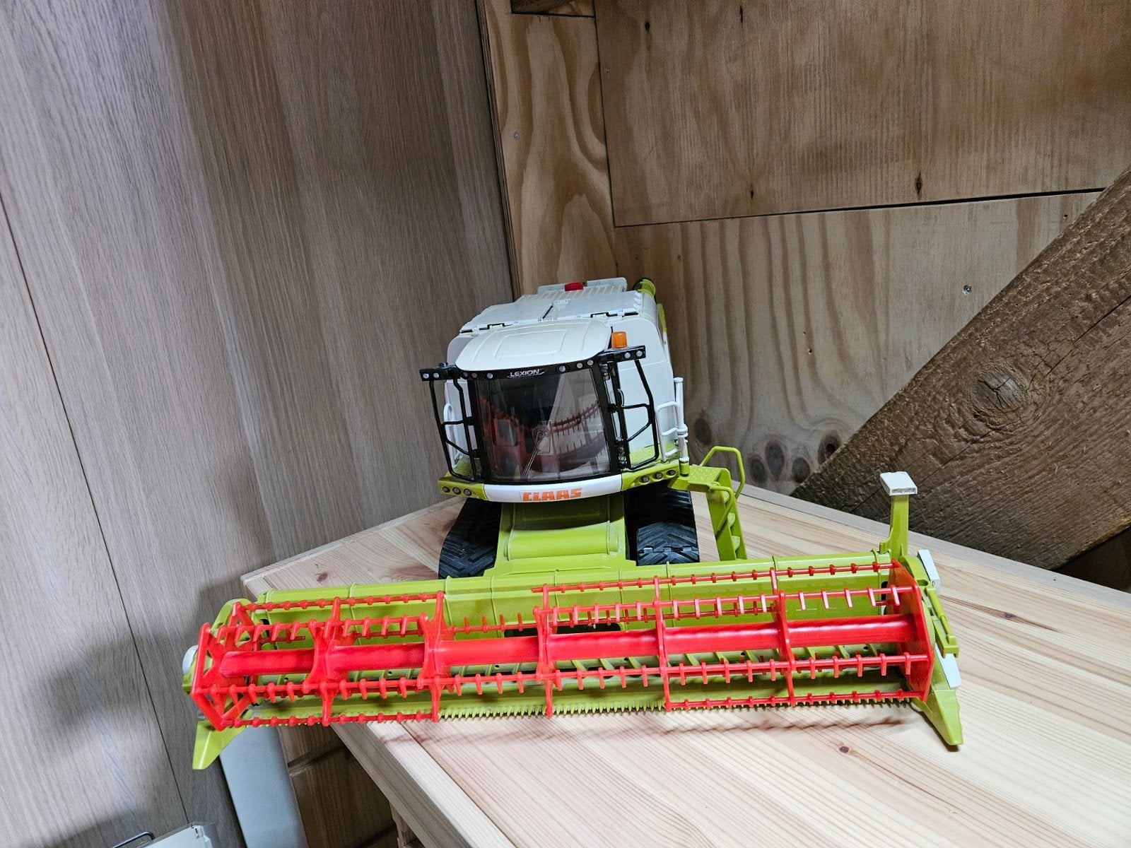 Bruder Combine Claas Lexion 780
Met aanhanger voor de haspel, Ophalen of Verzenden, Gebruikt