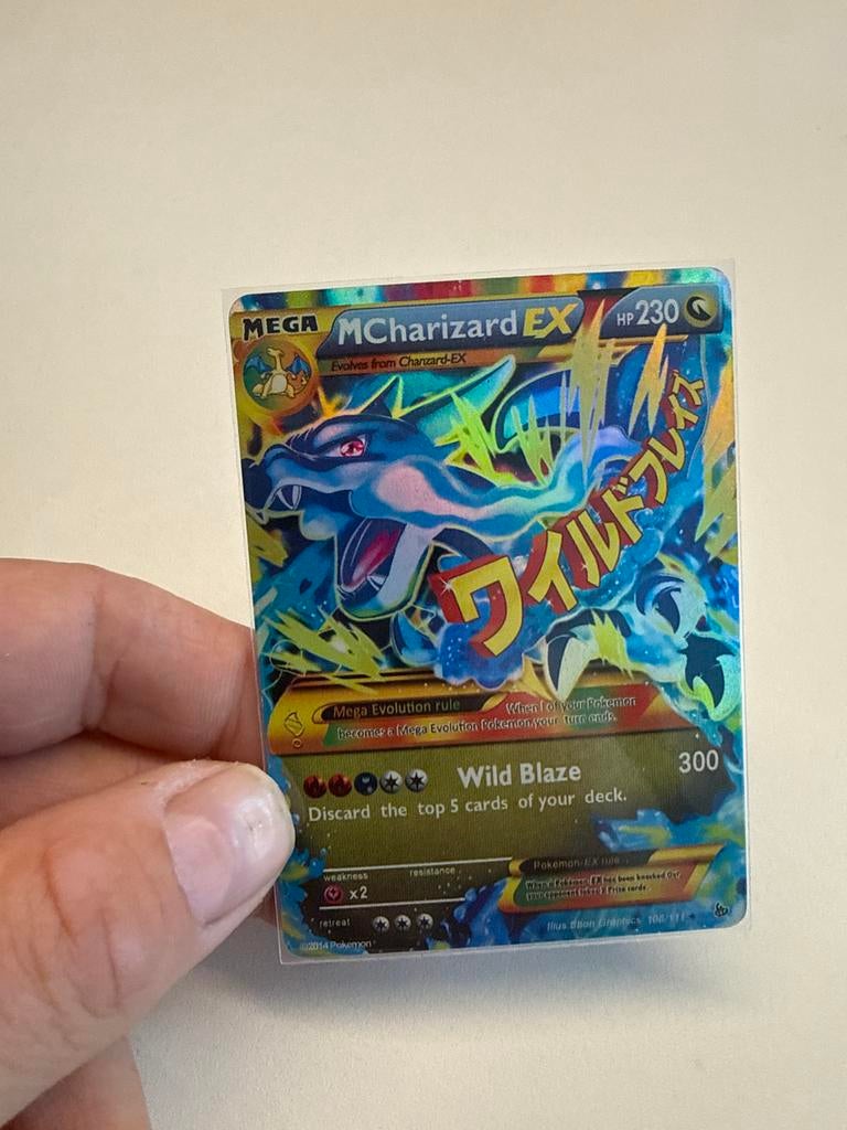 Pokémon M Charizard EX kaart, Ophalen of Verzenden, Zo goed als nieuw, Losse kaart, Foil