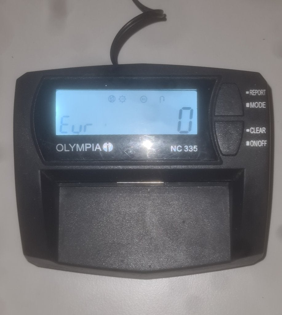 valsgelddetector  olympia NC 335, Ophalen