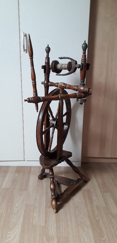 Antieke spinnenwiel, Ophalen