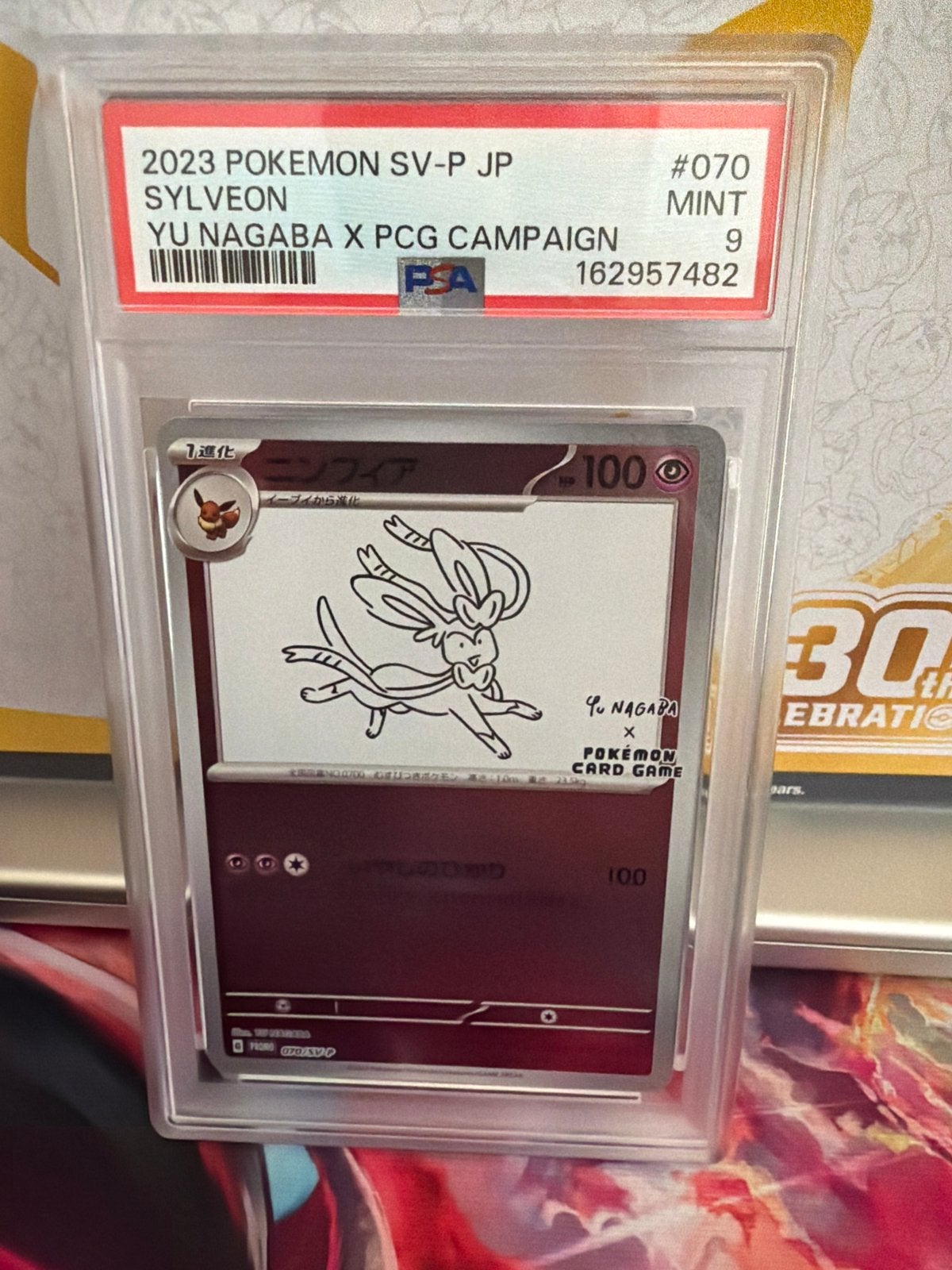 PSA 9 Sylveon Yu Nagaba x PCG Campaign Pokémon kaart, Ophalen, Zo goed als nieuw, Losse kaart
