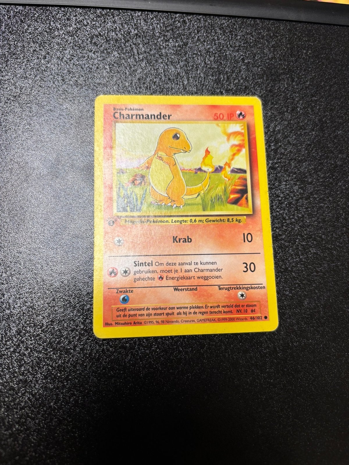 Charmander 46/102 Base Set First Edition Dutch, Hobby en Vrije tijd, Verzamelkaartspellen | Pokémon, Ophalen of Verzenden, Zo goed als nieuw