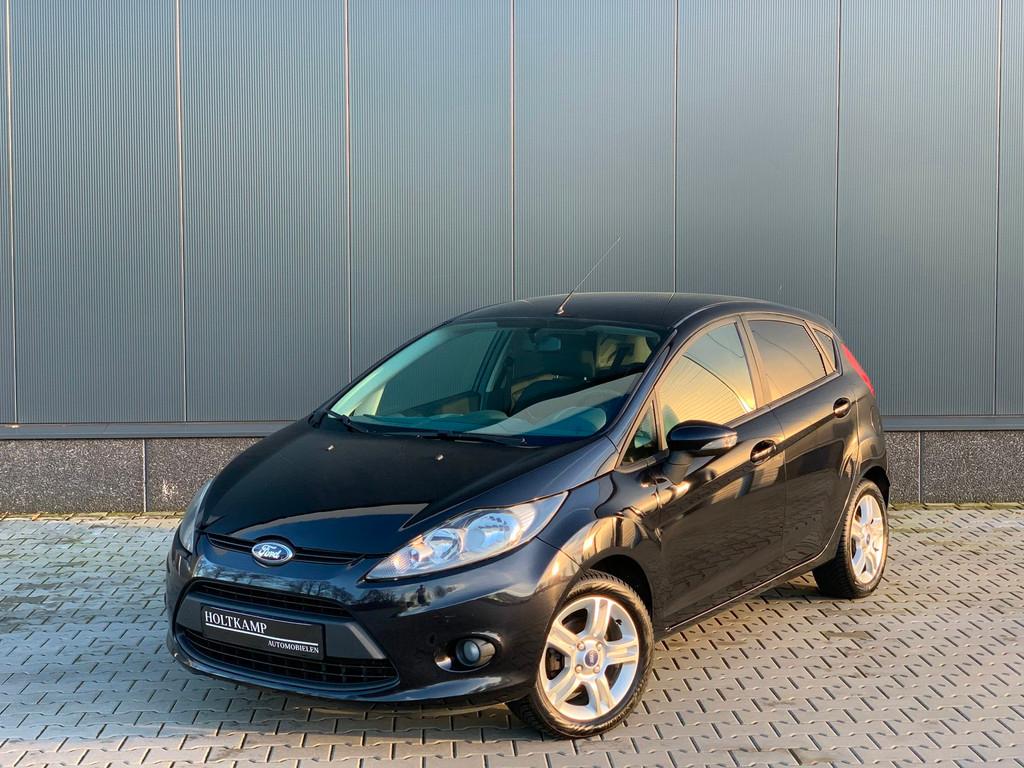 Ford Fiesta 1.25 Ghia | AIRCO | STOELVERWARMING | BLEUTOOTH, Voorwielaandrijving, Stof, Gebruikt, 4 cilinders