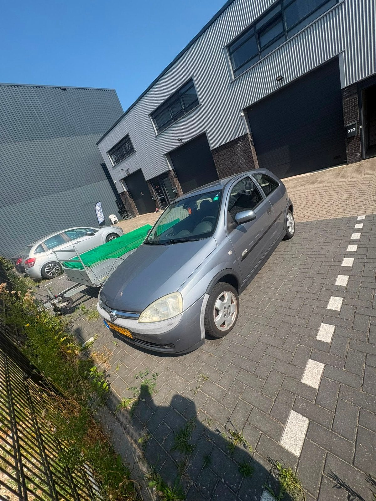 Opel Corsa 1.2 16V 3D 2003 Grijs, Auto's, Voorwielaandrijving, Stof, 74 pk, Origineel Nederlands