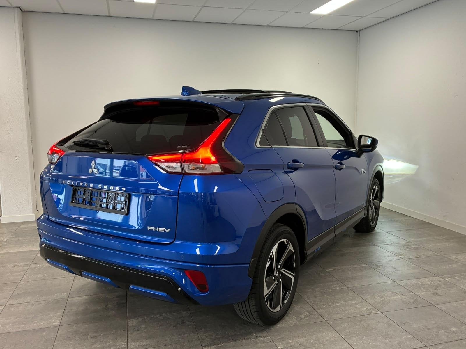 Mitsubishi Eclipse Cross 2.4 PHEV Instyle | Panoramadak | Le, Auto's, Automaat, 14 kWh, 4 cilinders, Blauw