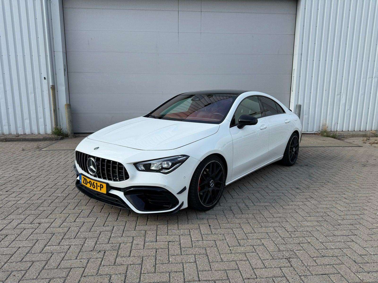 Mercedes-Benz CLA 200 Coupé | AMG pakket | Ambient | NL-auto, CLA, Zwart, 4 cilinders, Particulier