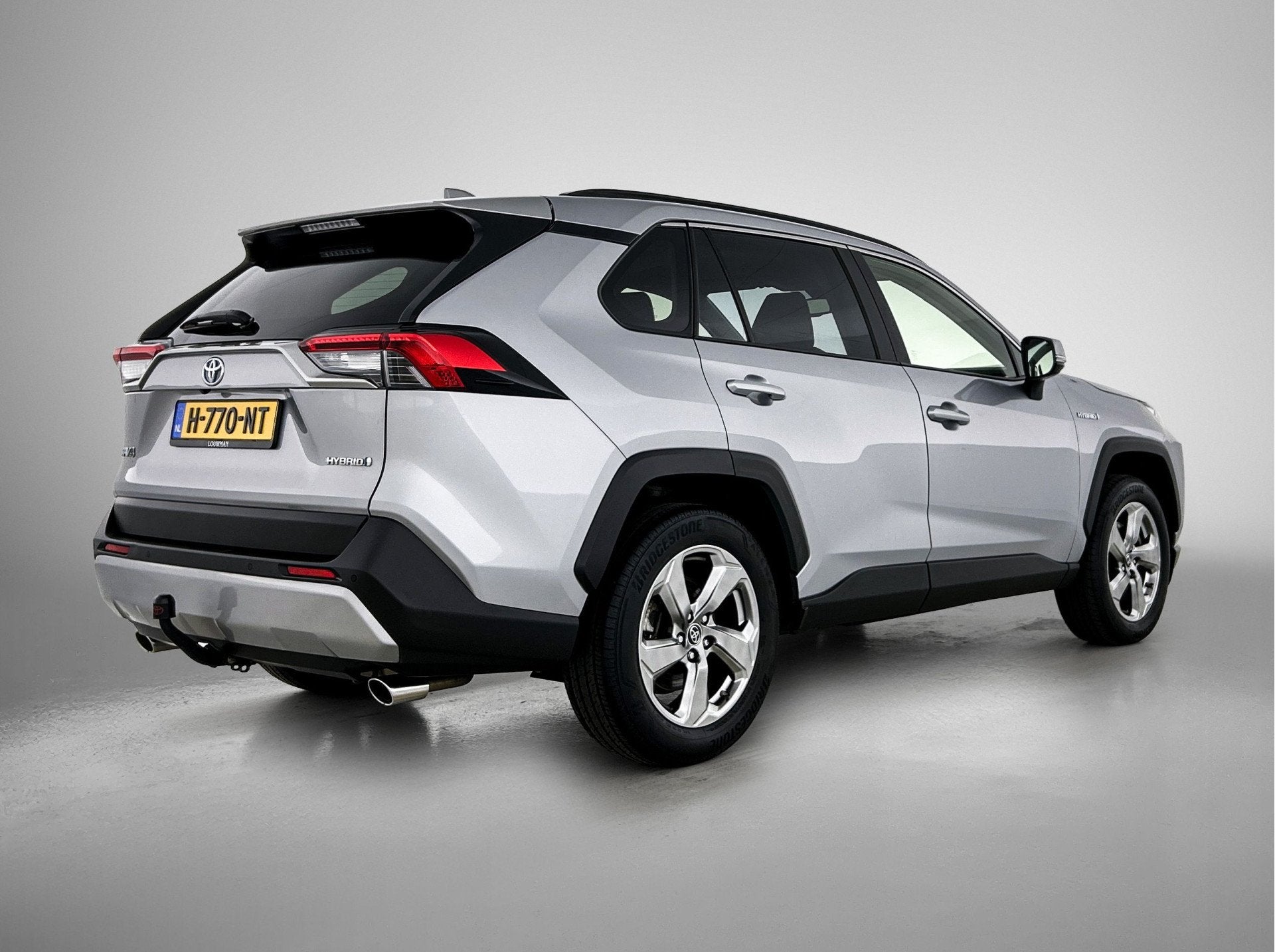 Toyota RAV4 2.5 Hybrid Style | Trekhaak | (bj 2019), Auto's, Toyota, Stof, Gebruikt, 4 cilinders, Bedrijf