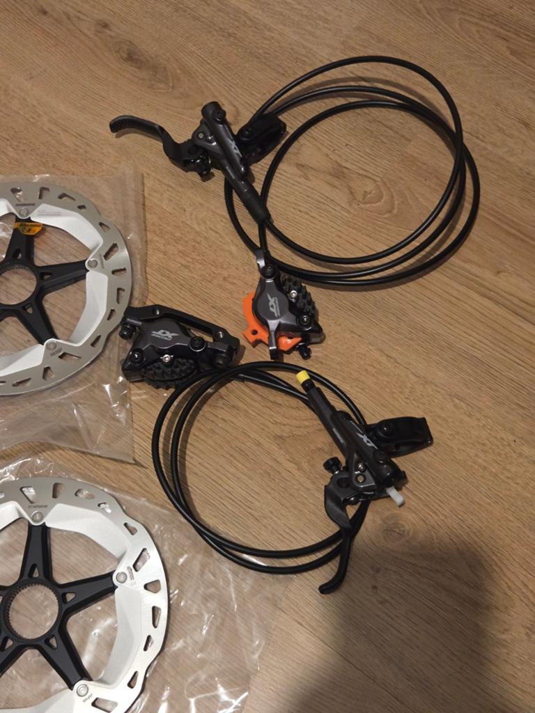 Nieuwe Shimano Deore XT Remset Voor & Achter (Compleet), Fietsen en Brommers, Fietsonderdelen, Remmen, Nieuw, Ophalen of Verzenden
