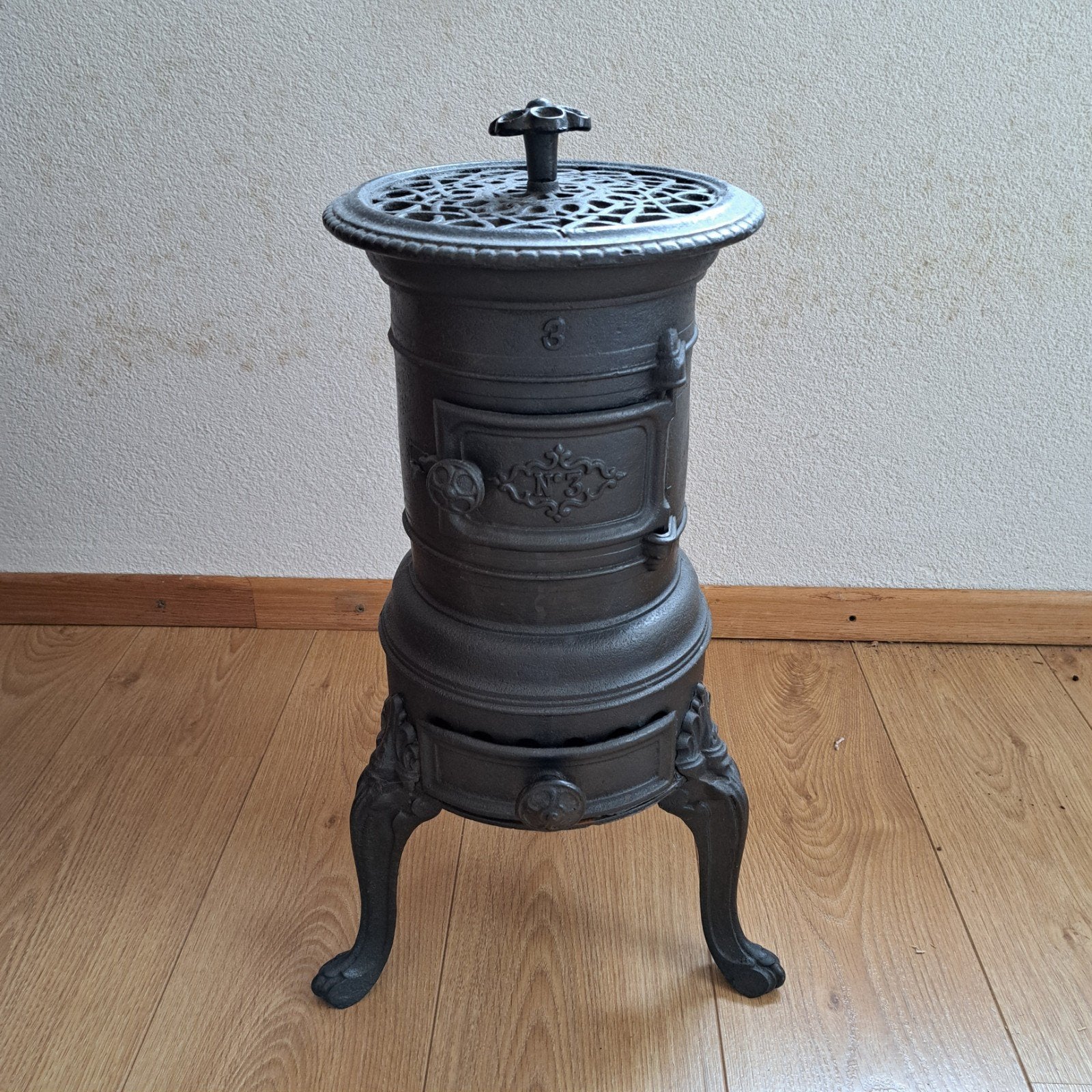 Antieke gietijzeren potkachel - decoratief en functioneel, Huis en Inrichting, Kachels, Ophalen, Potkachel, Gebruikt, Vrijstaand