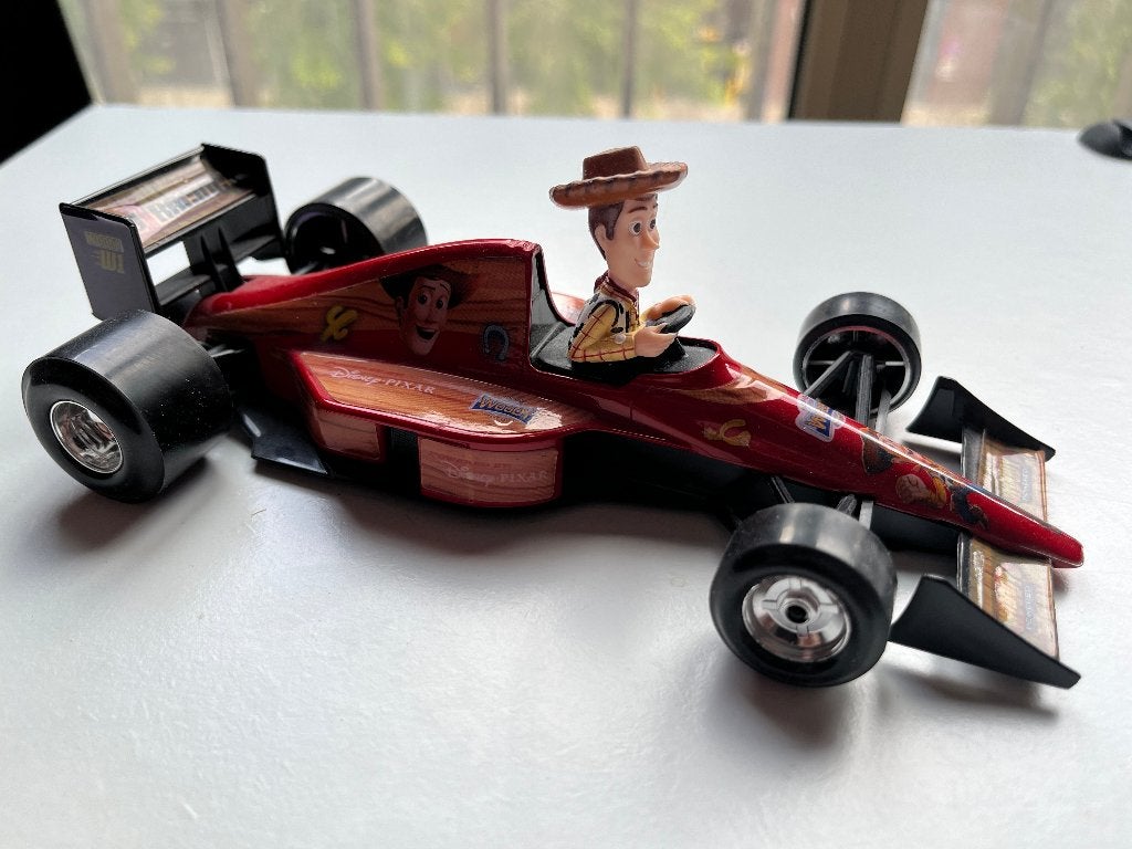 Bburago Disney Formula Toy Story Woody F1 auto, Ophalen of Verzenden, Overige figuren, Zo goed als nieuw, Beeldje of Figuurtje