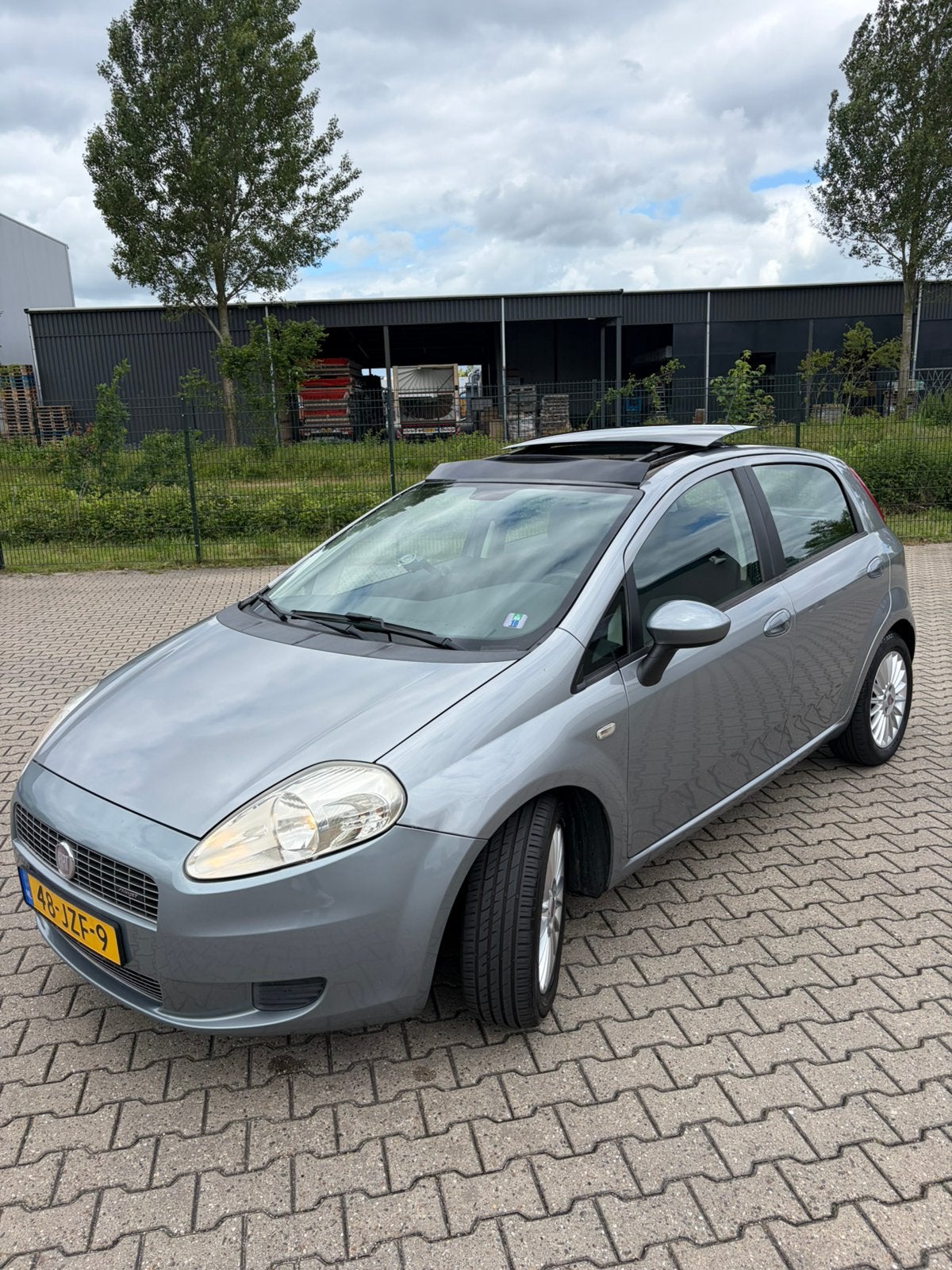 Fiat Grande Punto Edizione Lusso 2009 Panoramadak | Airco, Voorwielaandrijving, Stof, 40 €/maand, 400 kg
