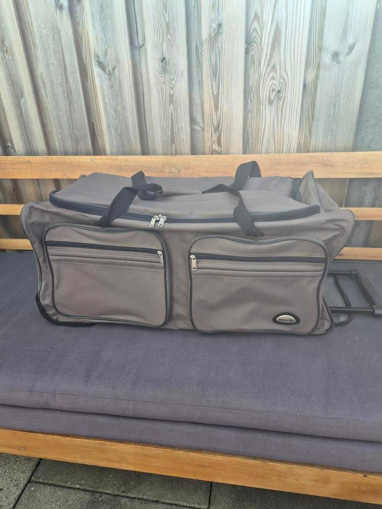 Reis tas met wieltjes en uitschuifbare handgreep, Bruin, Minder dan 35 cm, Ophalen of Verzenden, Zo goed als nieuw