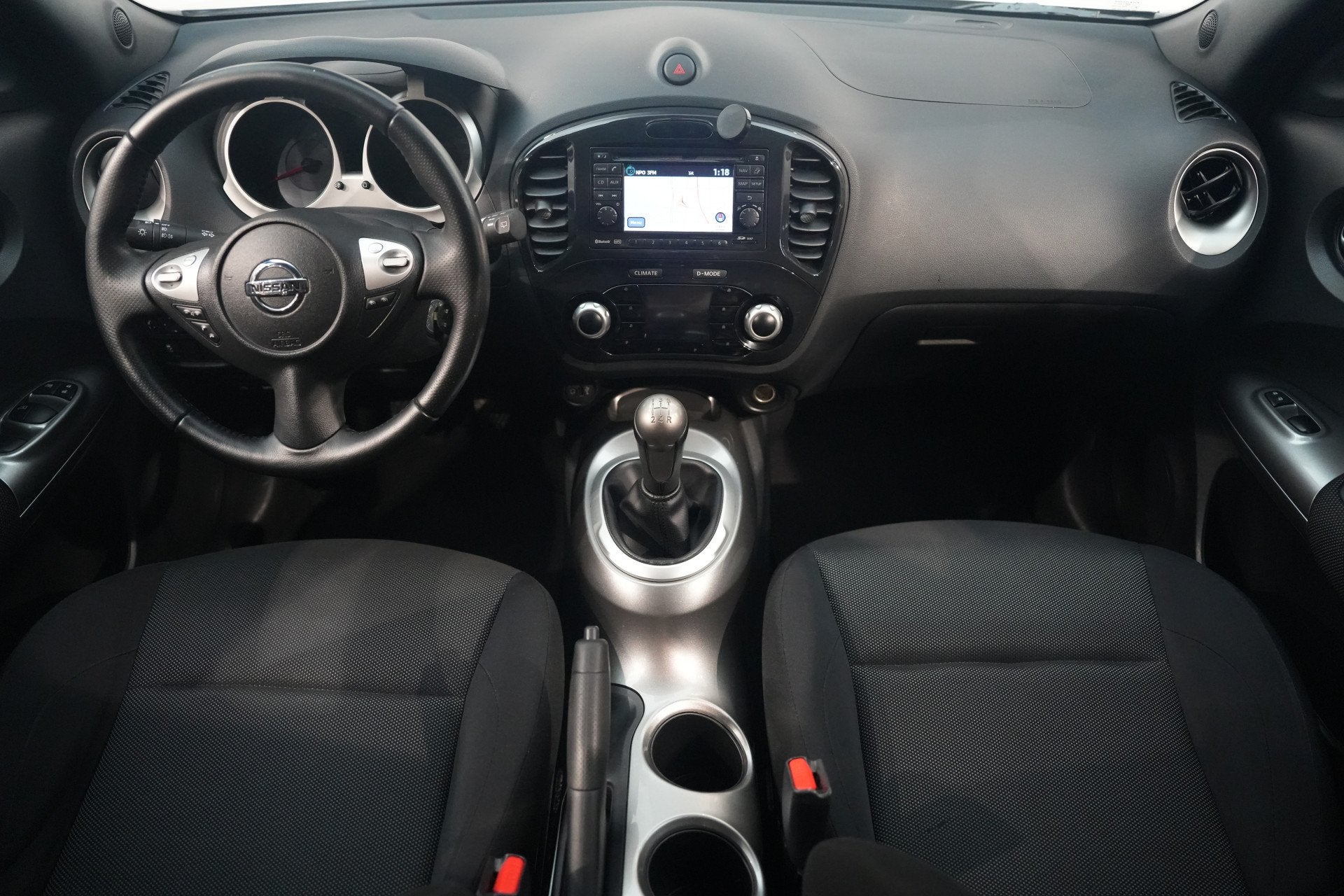 Nissan Juke 1.6 Acenta ✅ NAVI ✅ CAMERA ✅ CRUISE ✅ AU, Auto's, Stof, Zwart, 4 cilinders, 49 €/maand