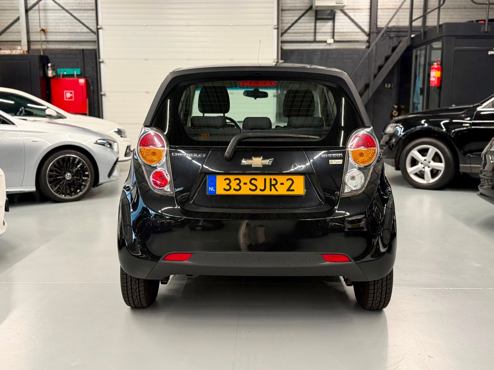 Chevrolet Spark 1.0 16V LS Bi-Fuel Navi l Cruise l Airco, Auto's, Stof, Zwart, Zwart, Origineel Nederlands