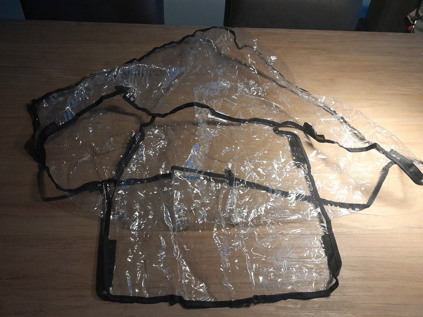 Waterdichte regenhoes voor buggy, Ophalen