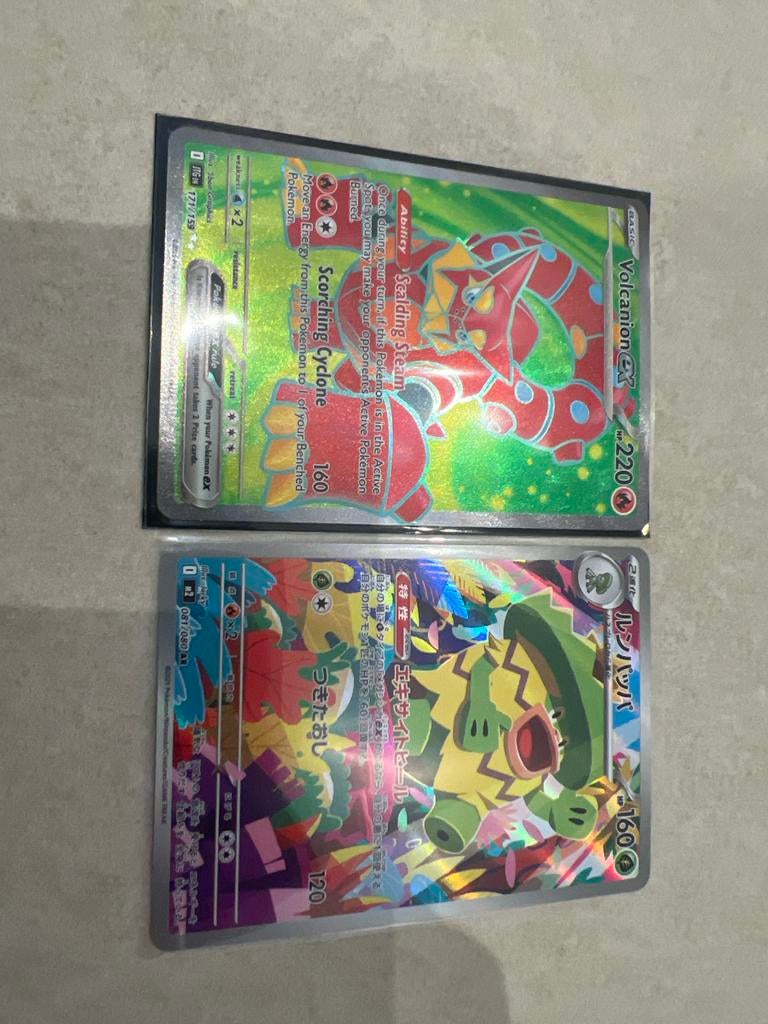 Pokémon Kaarten: Volcanion EX en Ludicolo AR, Ophalen of Verzenden, Zo goed als nieuw, Meerdere kaarten, Foil