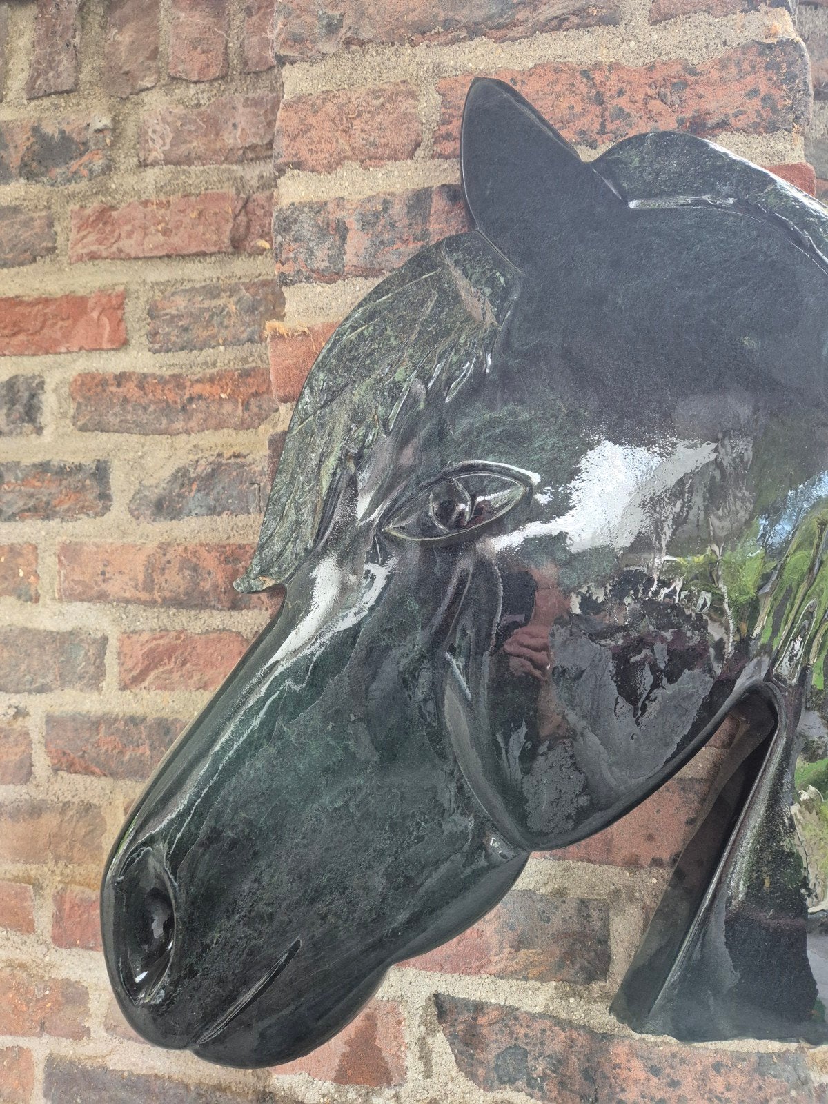 2x stenen paardenhoofd, Ophalen