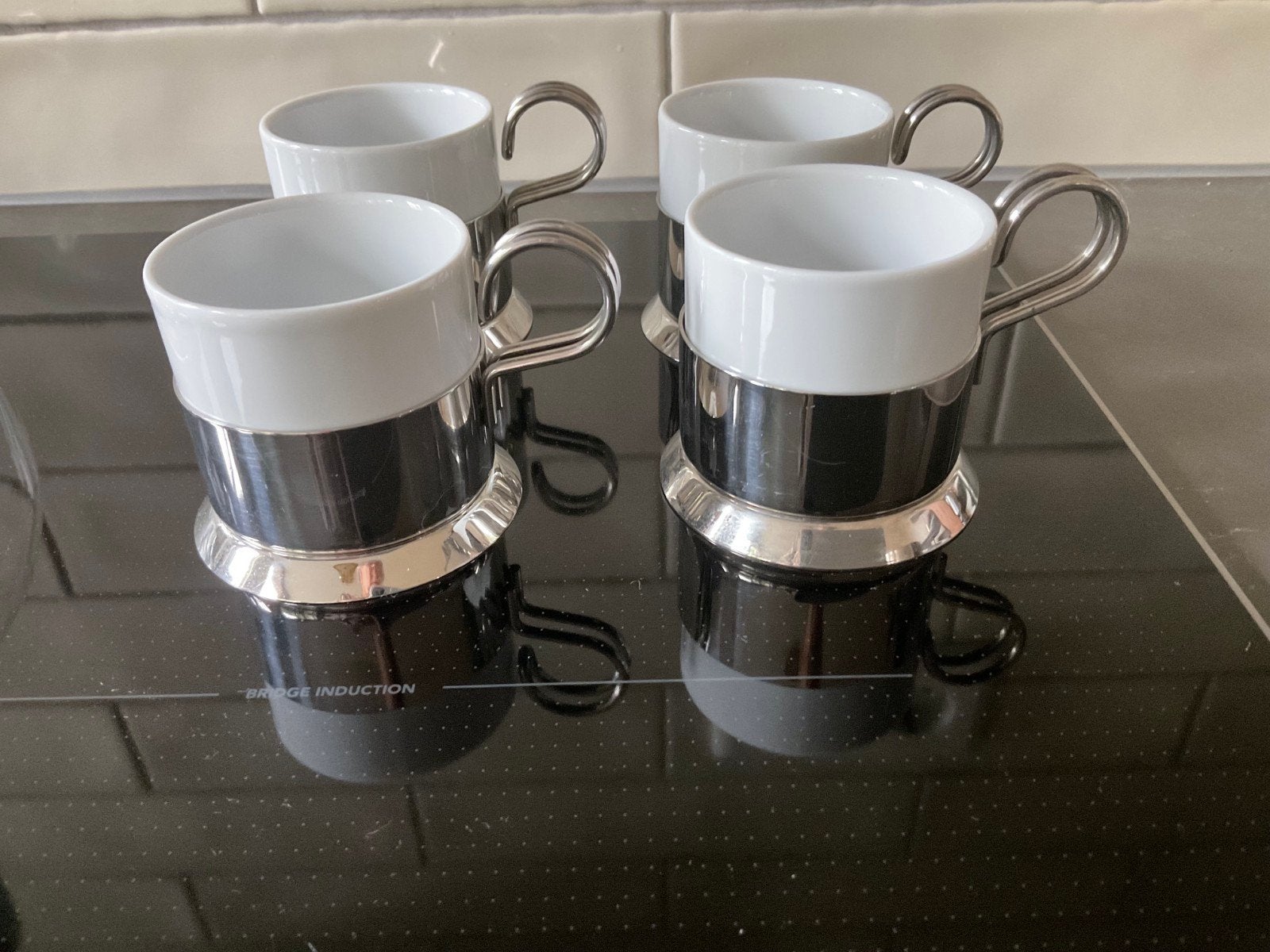 MENU Norm espressokopjes met rvs houder (4), Ophalen of Verzenden, Porselein, Overige stijlen, Kop(pen) en/of Schotel(s)
