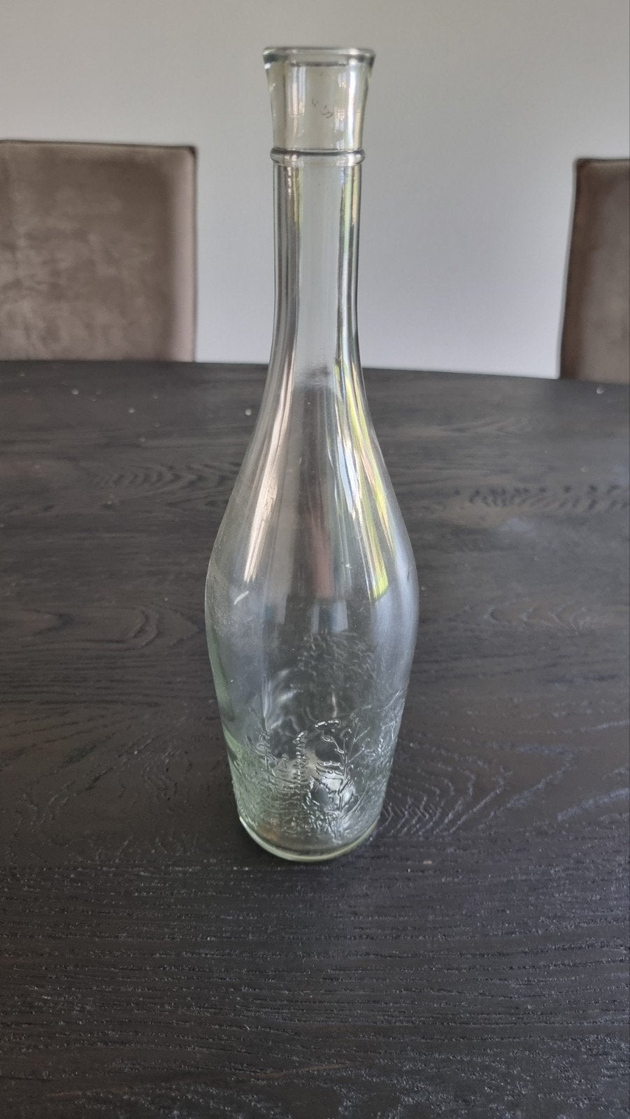 Decoratieve glazen fles met reliëf, Verzenden