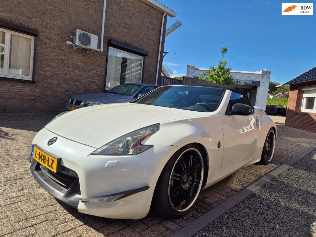 Nissan 370Z Roadster 3.7 V6 Pack Stillen Supercharged, Auto's, Automaat, Gebruikt, Zwart, Cabriolet