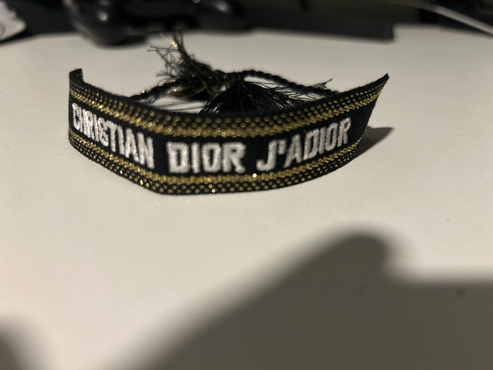 Christian Dior J'ADIOR armband zwart goud, Ophalen of Verzenden, Zo goed als nieuw, Zwart, Overige materialen