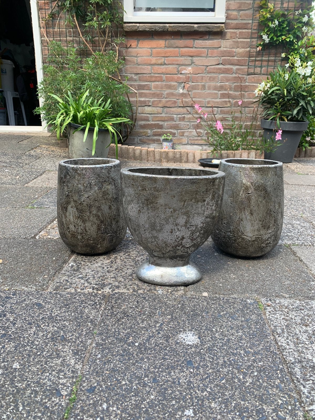 Set zware zwart/zilver bloempotten, Tuin en Terras, Bloempotten, Ophalen, Steen, Gebruikt, Rond