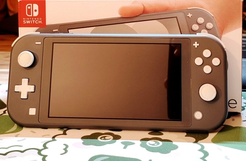 Nintendo switch lite, Ophalen, Zo goed als nieuw
