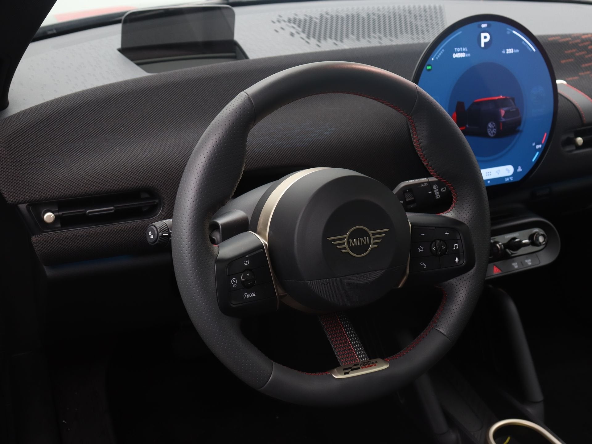 MINI Cooper E John Cooper Works Pakket XL (bj 2024), Auto's, Gebruikt, Zwart, Met garantie (alle), 4 stoelen