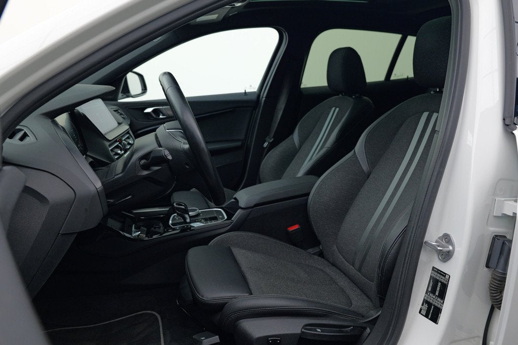 BMW 1-serie 118i Executive Edition | Pano | Stoelverwarming, Gebruikt, Automatische klimaatregeling, Met garantie (alle), Leder en Stof