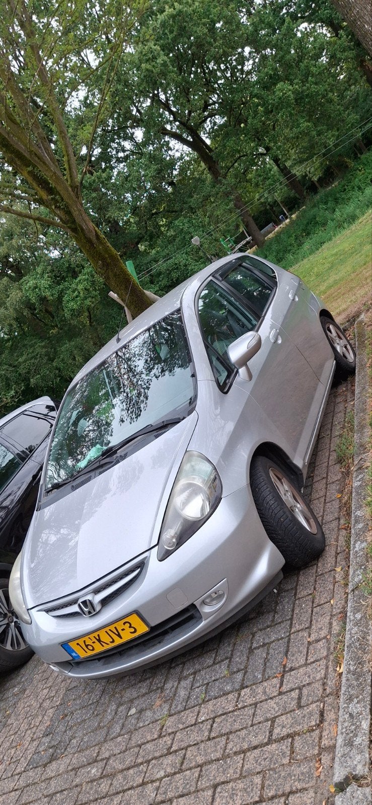 Honda Jazz 1.4 I 2008 Grijs, Auto's, Voorwielaandrijving, 83 pk, 450 kg, 40 €/maand