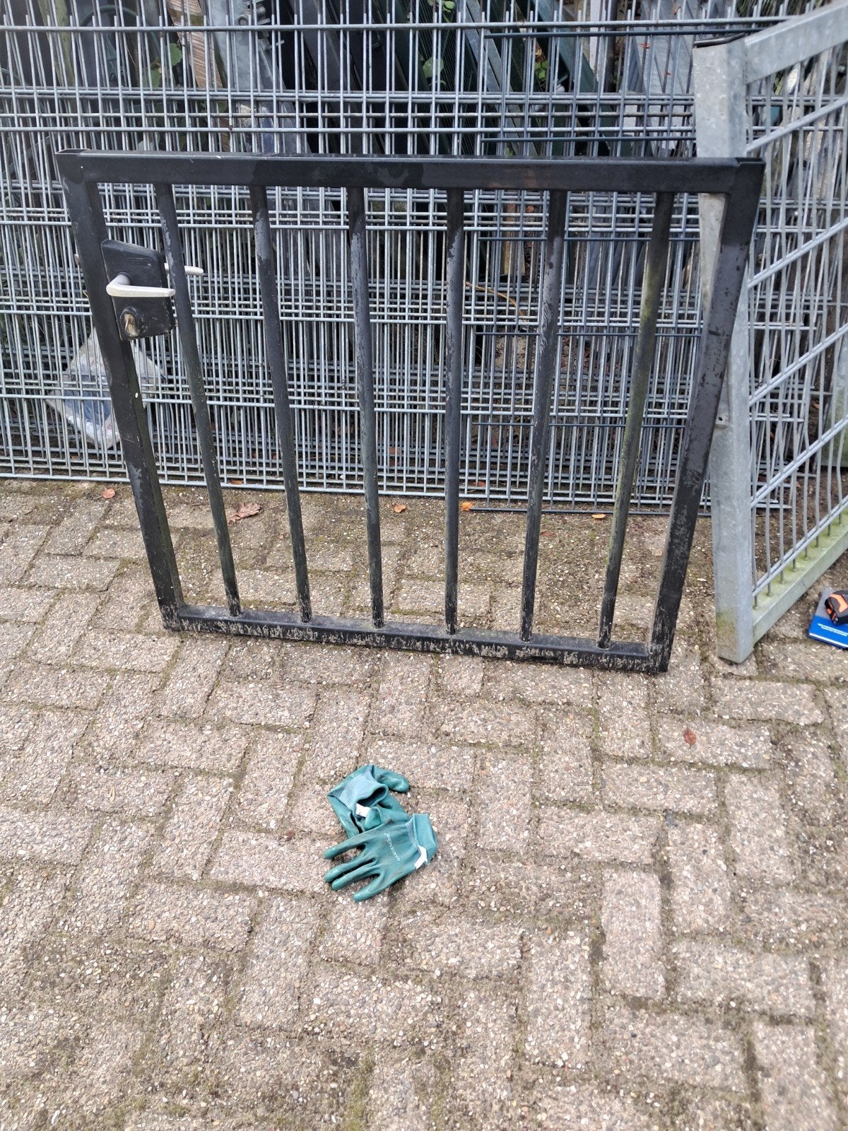 spijlen  inlooppoortje, Ophalen, IJzer