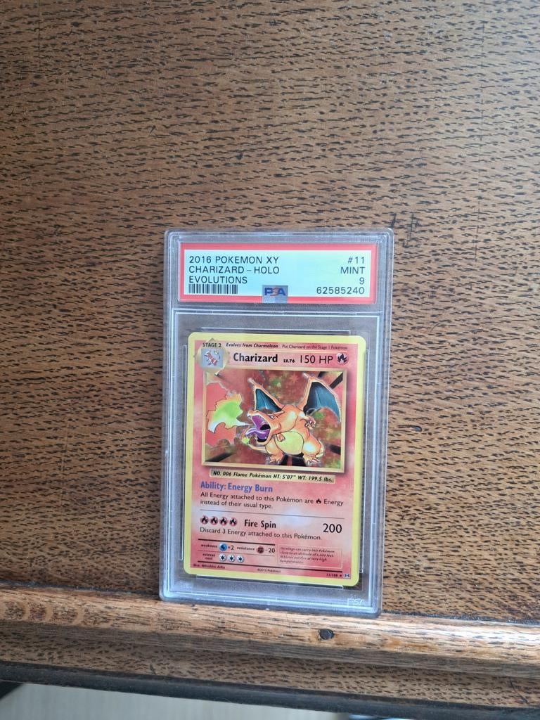 Charizard holo Evolutions 2016 PSA 9, Ophalen of Verzenden, Zo goed als nieuw