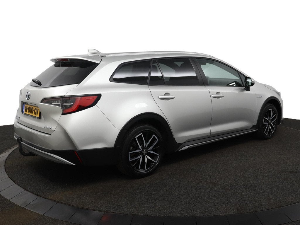 Toyota Corolla Touring Sports 1.8 Hybrid Trek | Electrische, Auto's, Toyota, 12 maanden, Gebruikt, 4 cilinders, Corolla