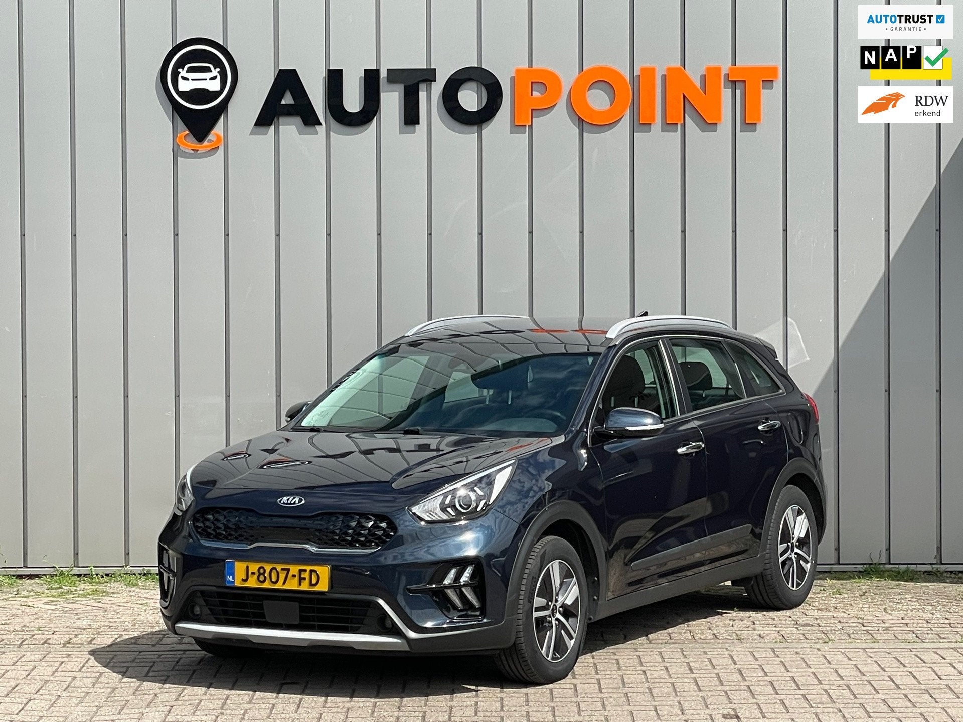 Kia Niro 1.6 GDi Hybrid DynamicLine DEALER OND EERSTE EIG, Auto's, Gebruikt, Blauw, Leder en Stof, Origineel Nederlands
