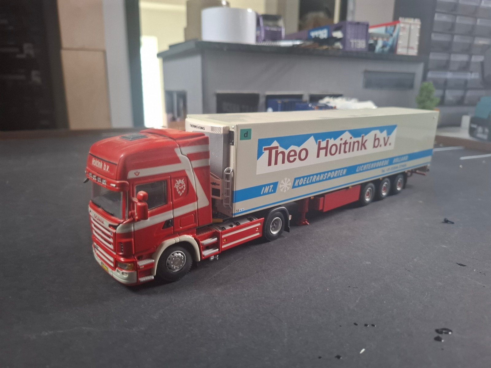 Scania  Theo Hoitink, Hobby en Vrije tijd, Modelauto's | 1:50, Ophalen of Verzenden, Nieuw, Bus of Vrachtwagen, Wsi