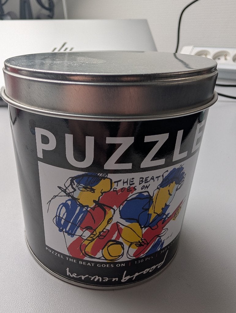 Herman Brood Puzzle in blik, Ophalen of Verzenden, Zo goed als nieuw, Overige
