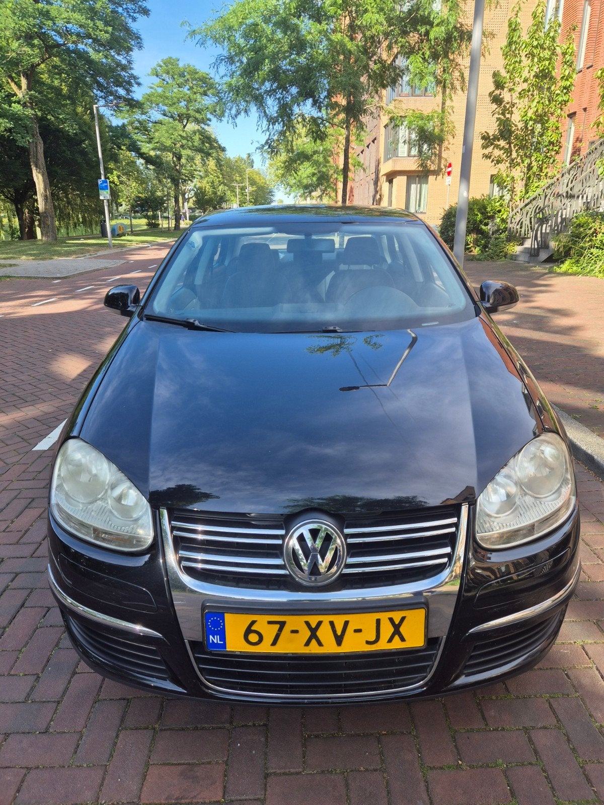 Volkswagen Jetta 1.6 FSI 85KW 2007 Zwart, Auto's, Volkswagen, Voorwielaandrijving, Stof, 4 cilinders, 1246 kg