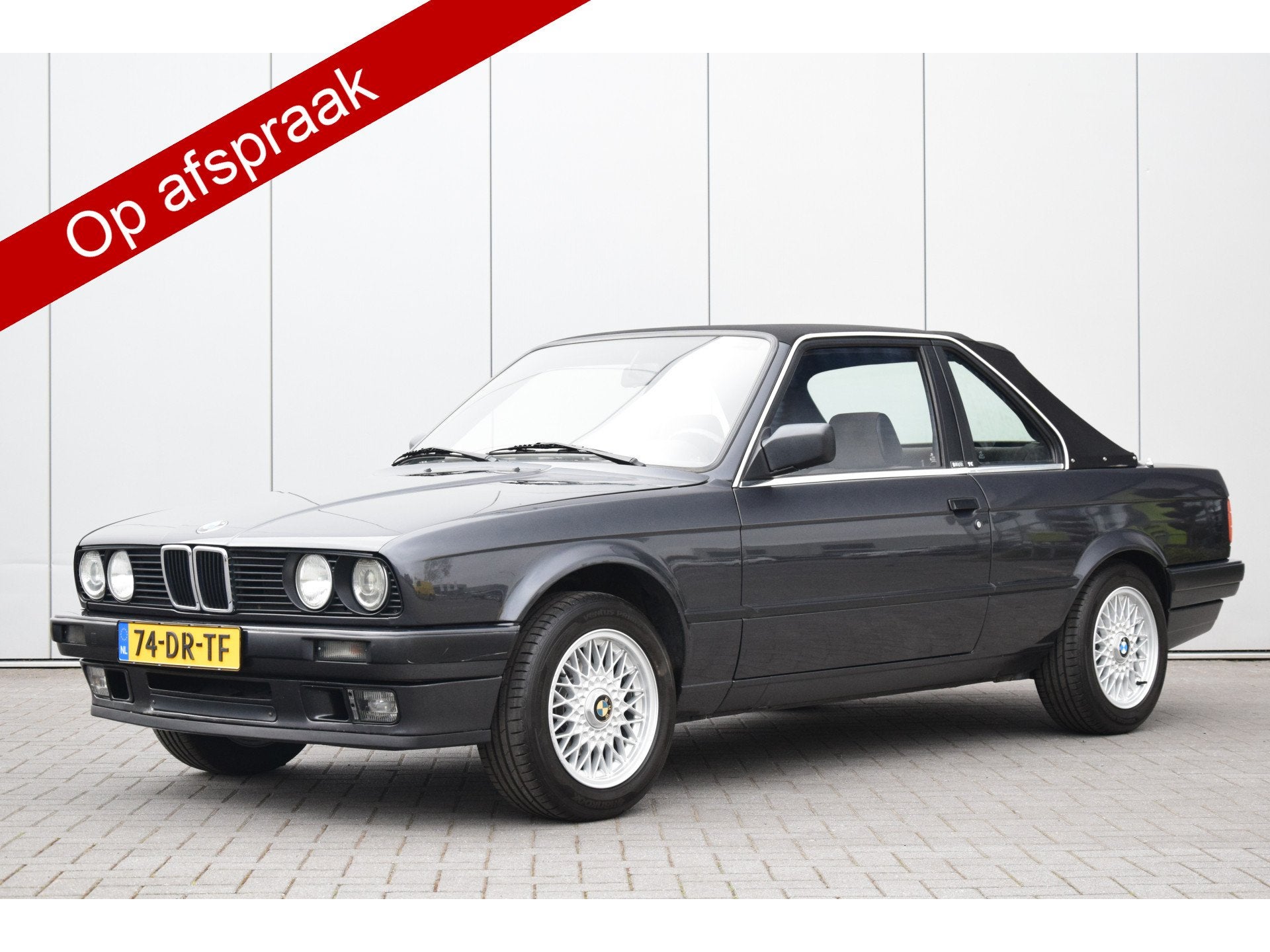 BMW 3 Serie Cabrio 316i Baur TC Diamantschwarz (bj 1991), Auto's, 1596 cc, Zwart, Cabriolet, Zwart