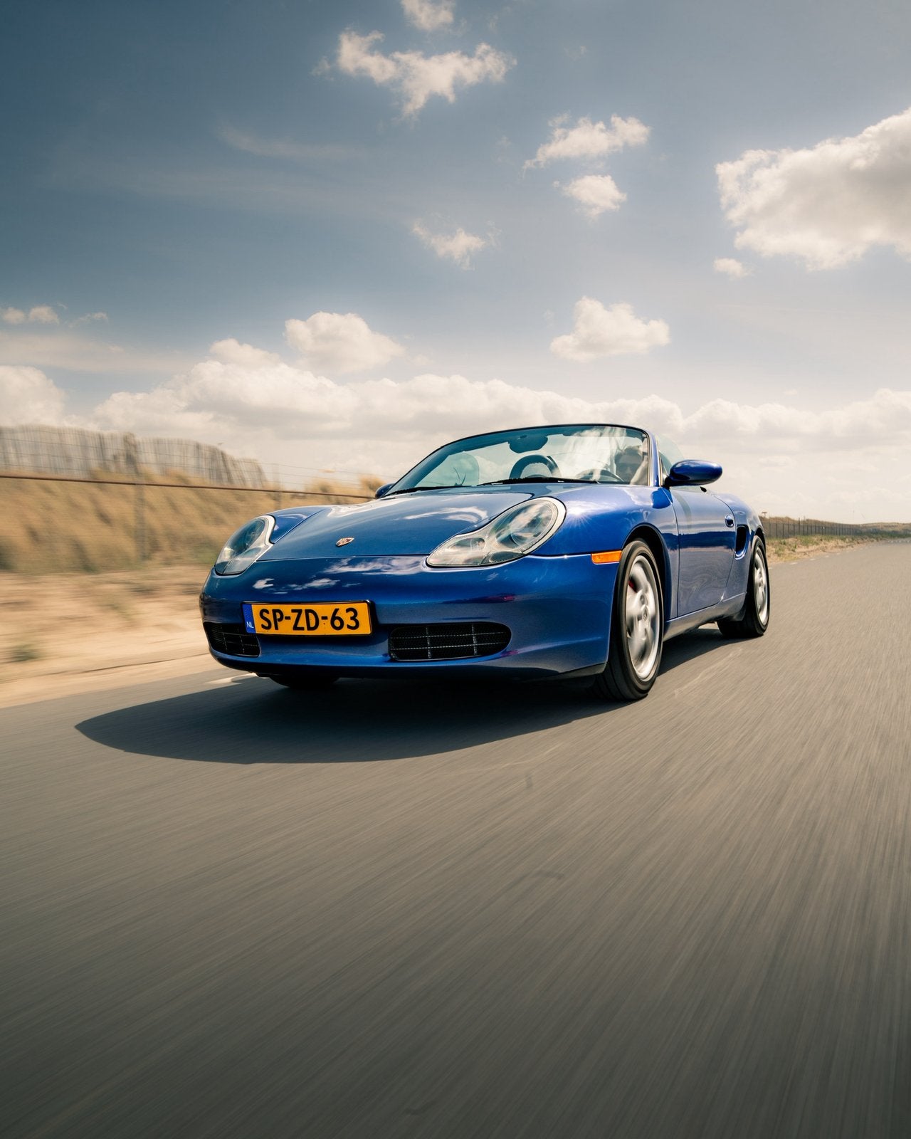 Porsche Boxster 2.5 1998 handgeschakeld, Auto's, Porsche, Achterwielaandrijving, Cabriolet, Blauw, Handgeschakeld