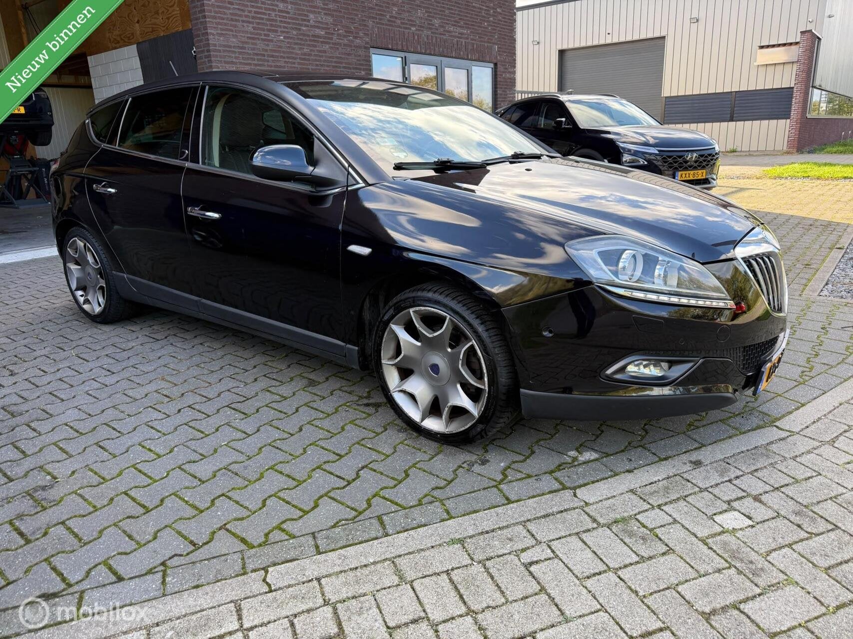 Lancia Delta 1.8-16V Di Executive, Auto's, Euro 5, Gebruikt, 4 cilinders, Zwart