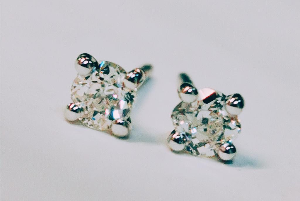 Solitaire oorstekers met diamant 0,55kt, Overige materialen, Ophalen of Verzenden, Zo goed als nieuw, Met edelsteen