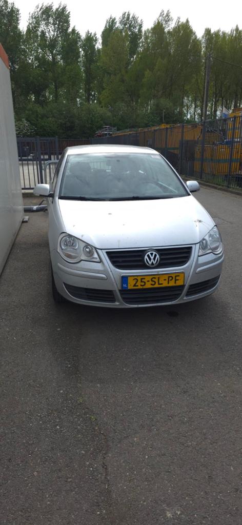 Volkswagen Polo 1.4 55KW 2006 Grijs, Auto's, Volkswagen, Voorwielaandrijving, 15 km/l, Origineel Nederlands, Handgeschakeld