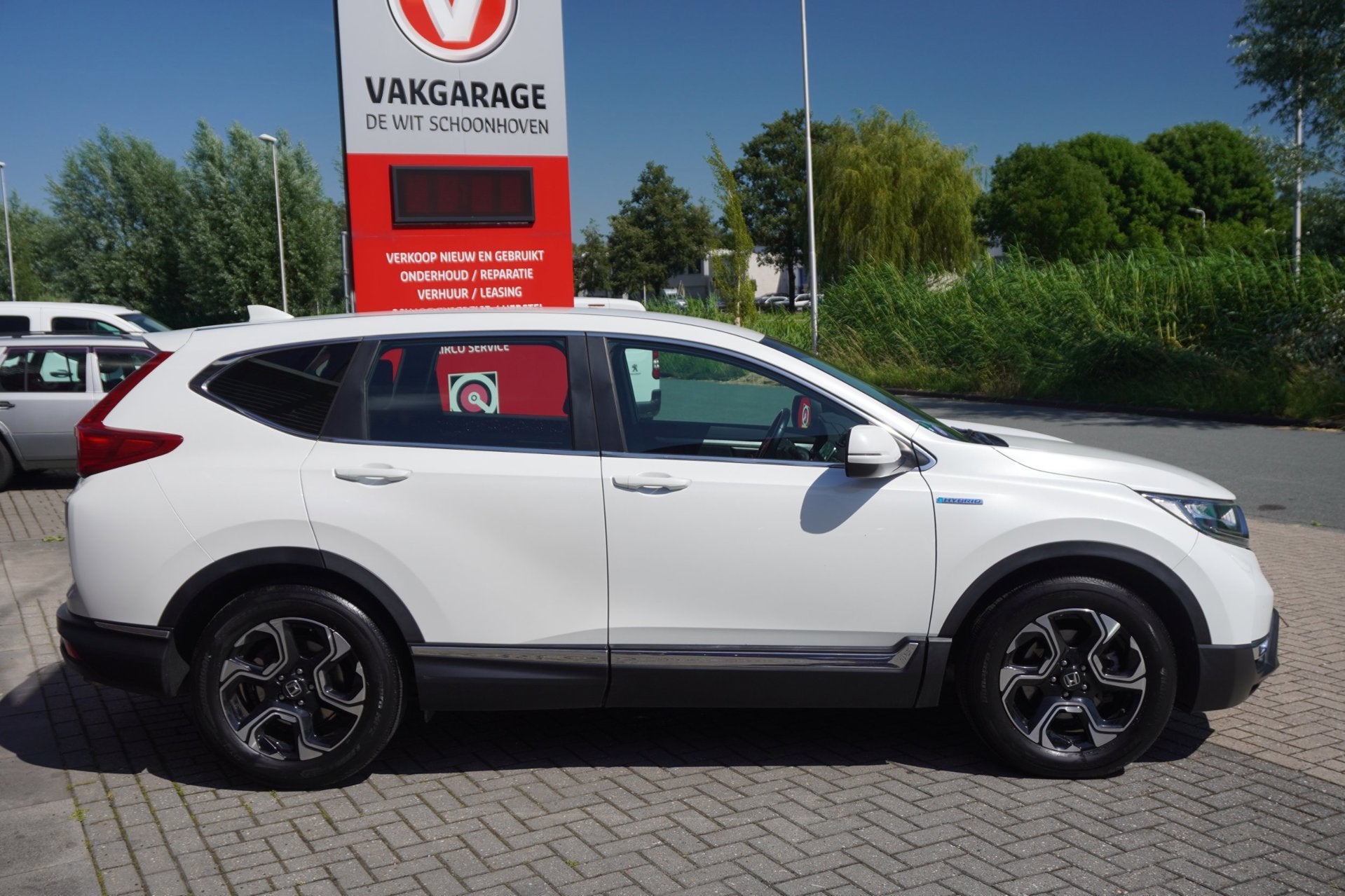 Honda CR-V 2.0 Hybrid Elegance / Incl winterbanden / Carplay, Stof, Gebruikt, Wit, Origineel Nederlands