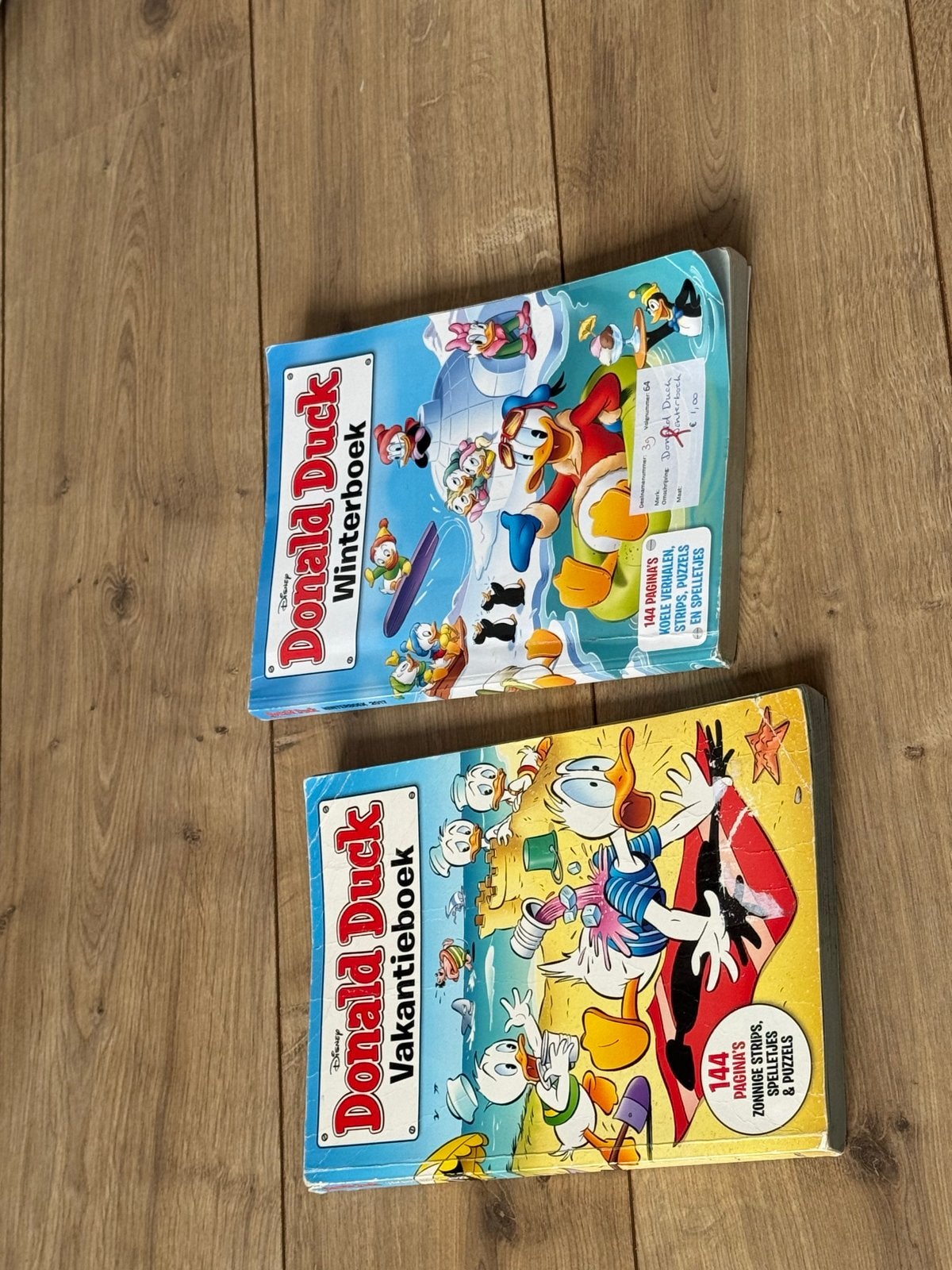 Donald Duck Winterboek & Vakantieboek - 2 stripboeken, Meerdere stripboeken, Ophalen, Gelezen