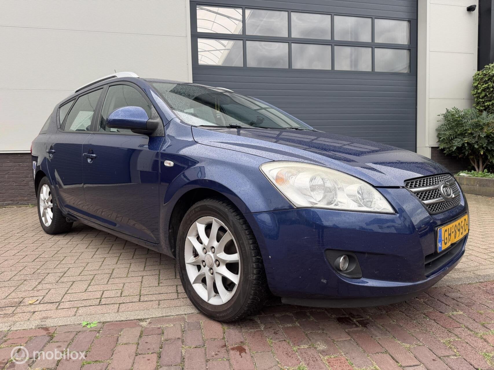 Kia cee'd Sporty Wagon 1.6 X-clusive AUTOMAAT/AIRCO/GOED OND, Auto's, Gebruikt, 1591 cc, 4 cilinders, Blauw