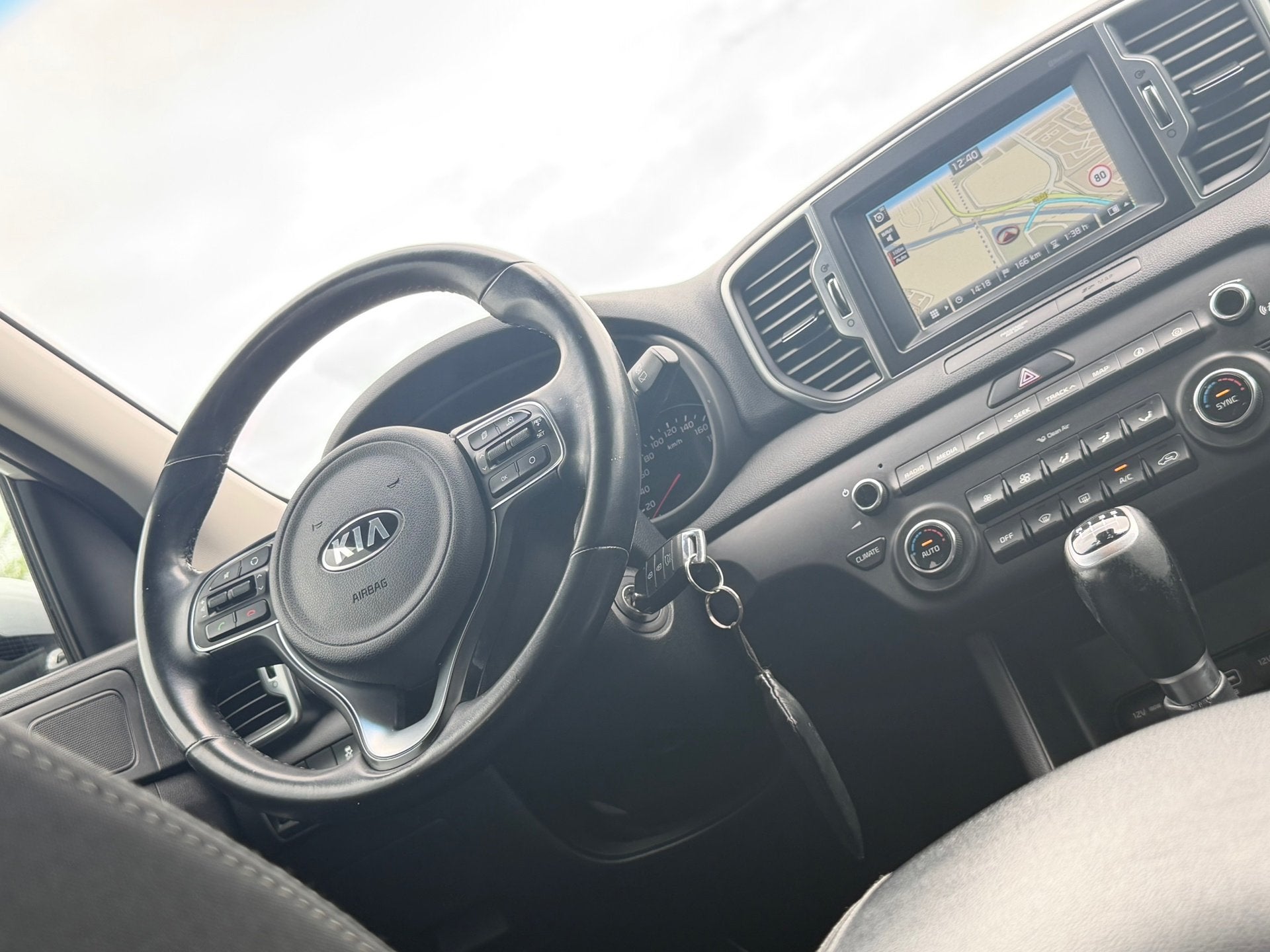 Kia Sportage 1.6 GDI First Edition - Sparkling Silver - Trek, Auto's, Kia, Voorwielaandrijving, Stof, Gebruikt, 4 cilinders