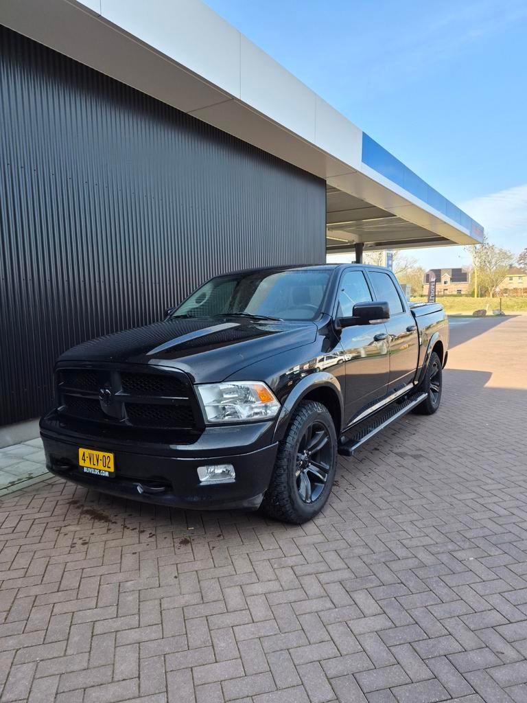 Dodge RAM Dodge RAM 2011, Auto's, Automaat, 5654 cc, Leder en Stof, Zwart