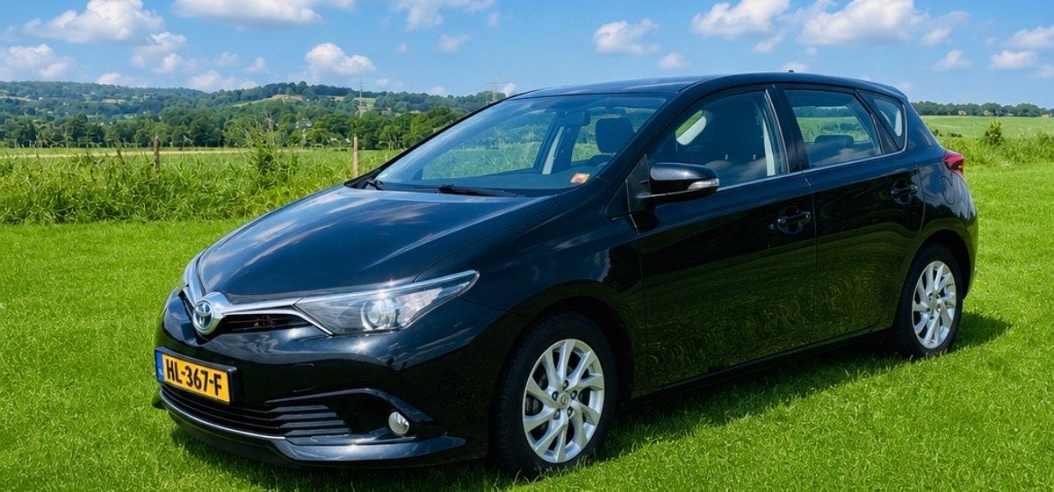 Toyota Auris 1.8 Hybrid 5DR CVT 2015 Zwart, Auto's, Toyota, 28 km/l, Zwart, Origineel Nederlands, 1798 cc